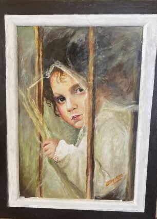 niña en la ventana